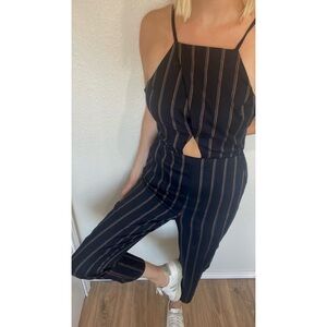 Navy striped jumpsuit in size extra small